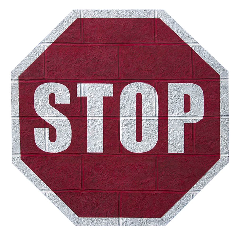 A cinder block wall that wants to be a stop sign - Nolan Haan